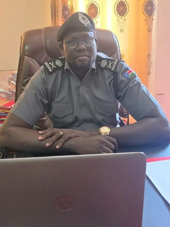 Portrait of Maj. Gen. John Pham Gatjiek, officer of the South Sudan National Civil Defense Service, in service uniform